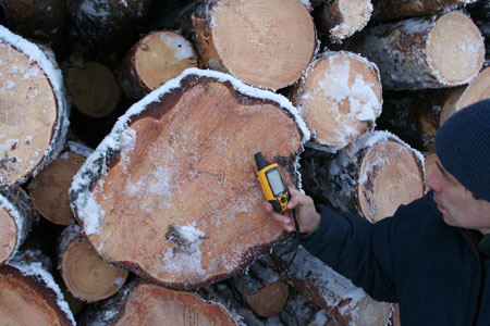 Greenpeace field team checking the positions and altitudes with GPS. Jooseppitunturi, December 2006.